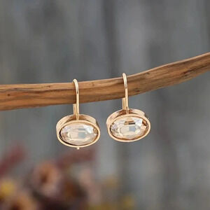 Gold plated drop earrings - peach coloured crystal